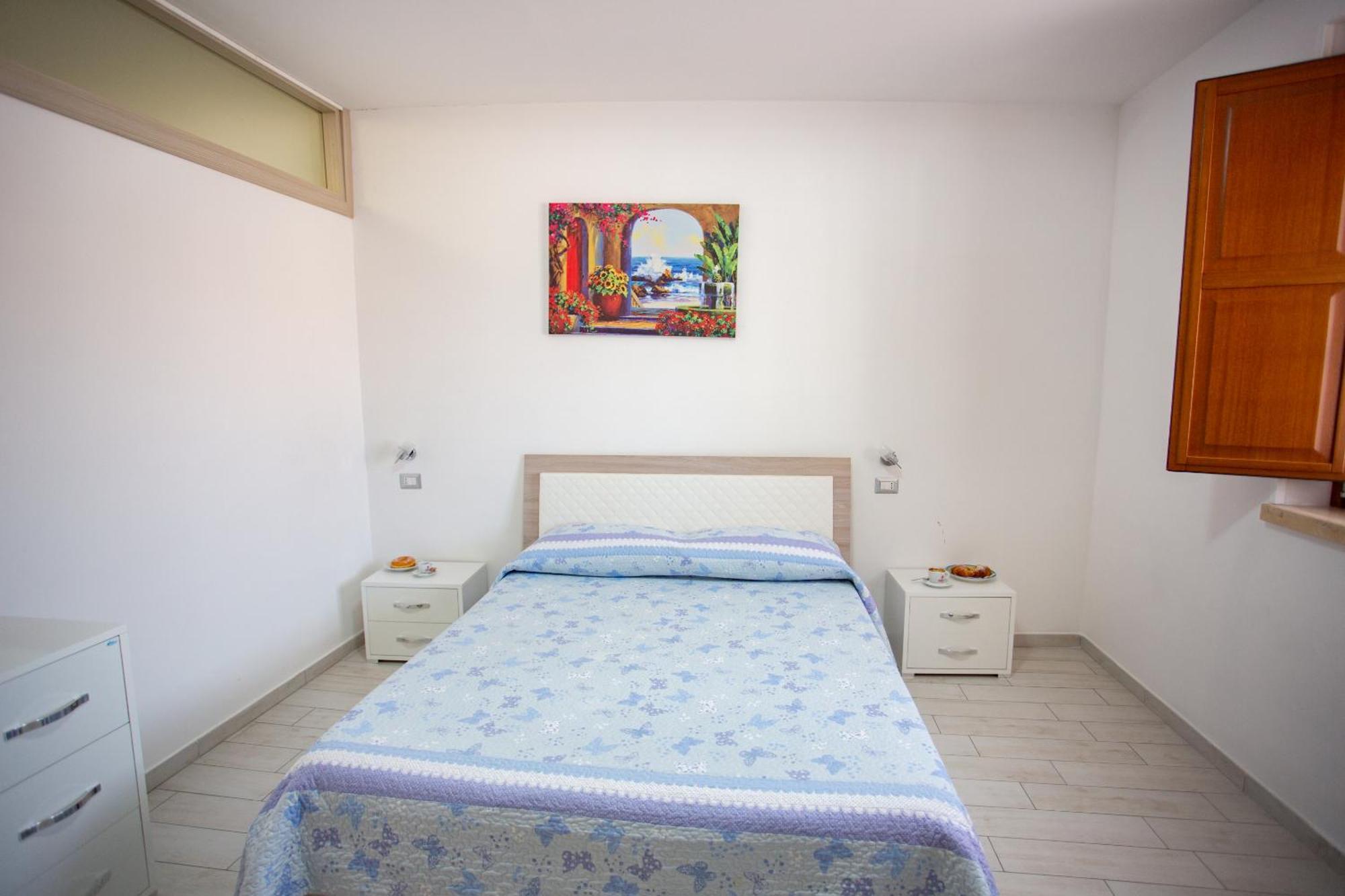 Odissea Residence E Rooms Санта-Марія-ді-Кастеллабате Номер фото