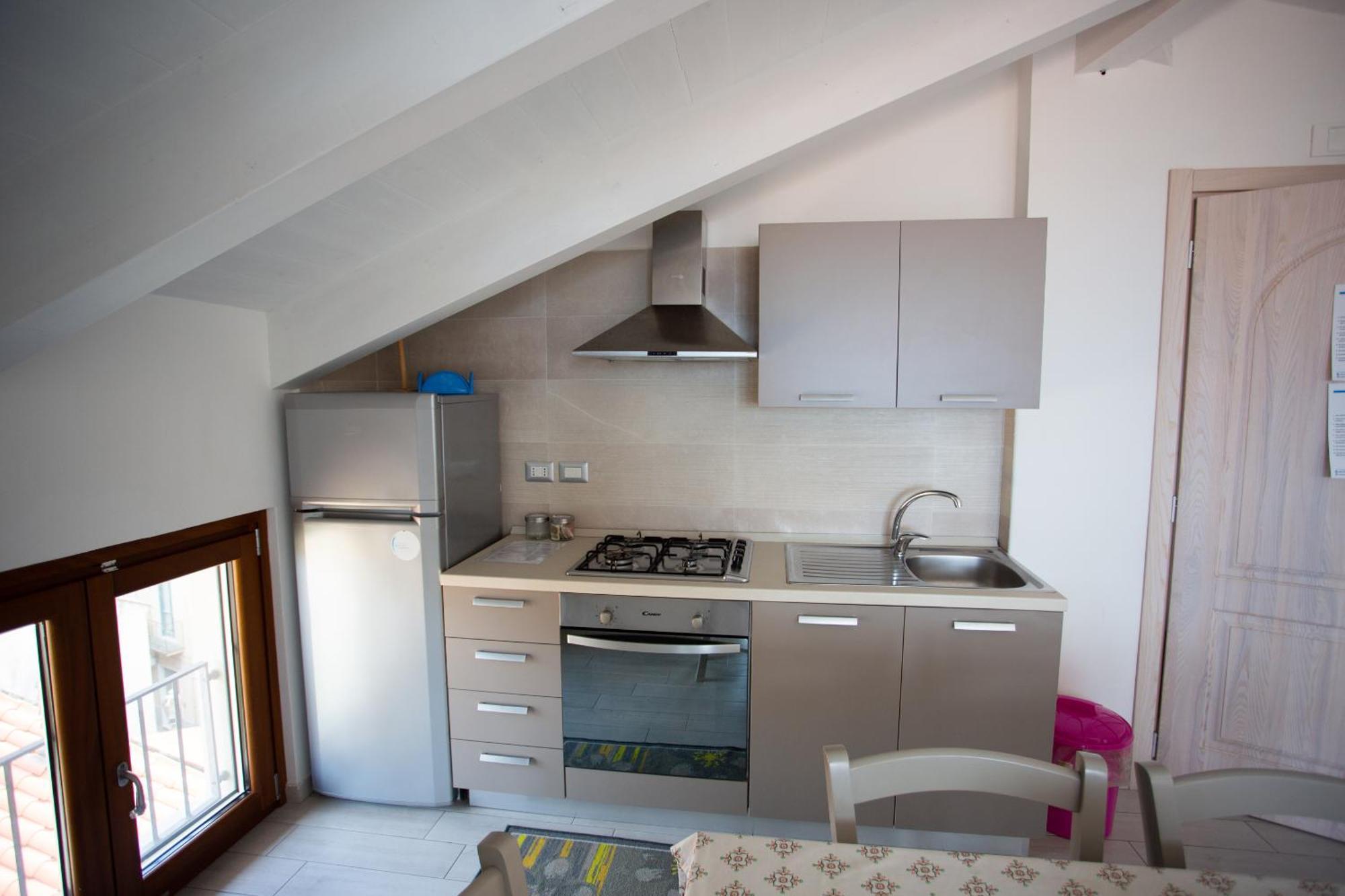 Odissea Residence E Rooms Санта-Марія-ді-Кастеллабате Номер фото