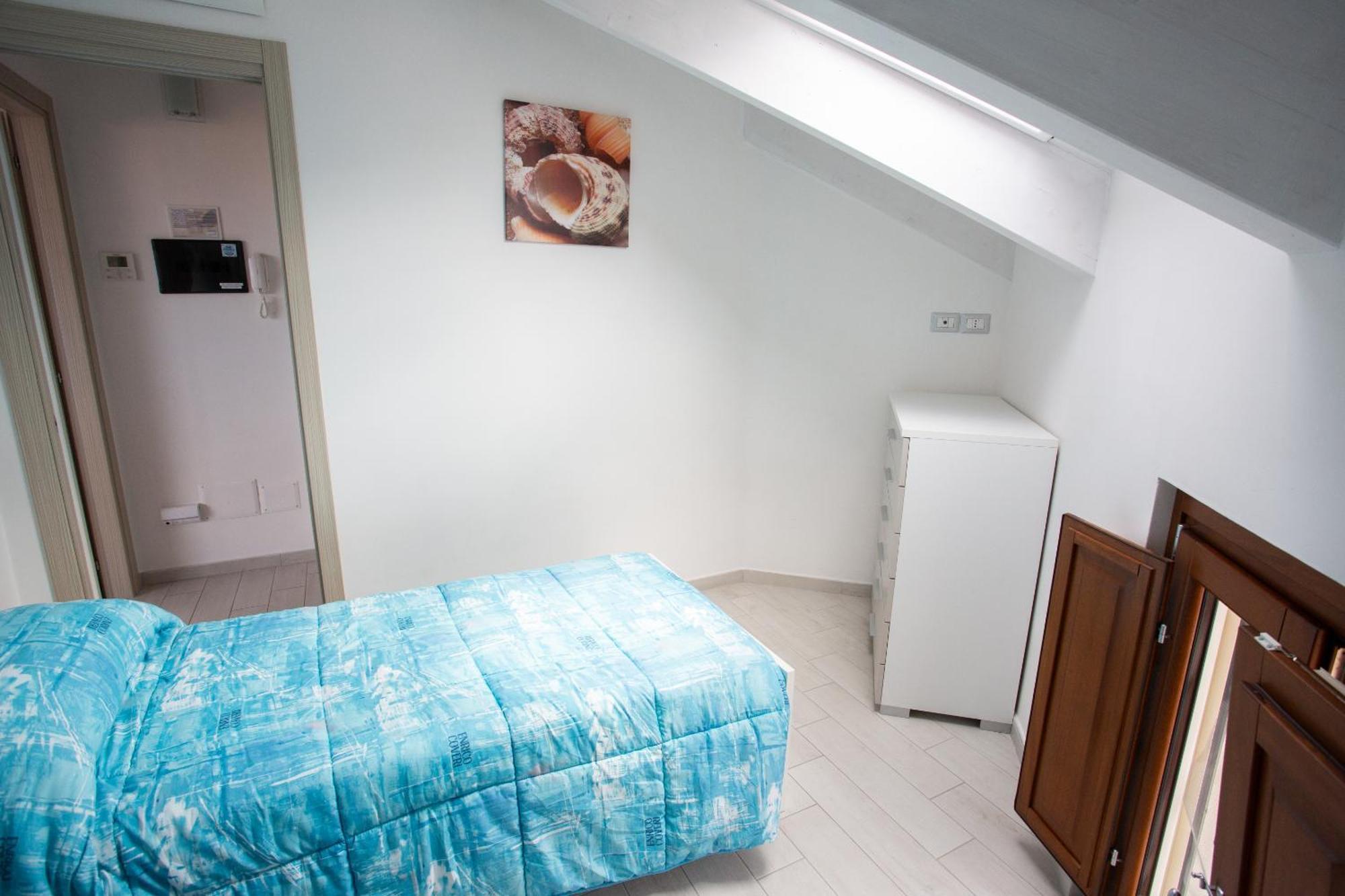 Odissea Residence E Rooms Санта-Марія-ді-Кастеллабате Номер фото