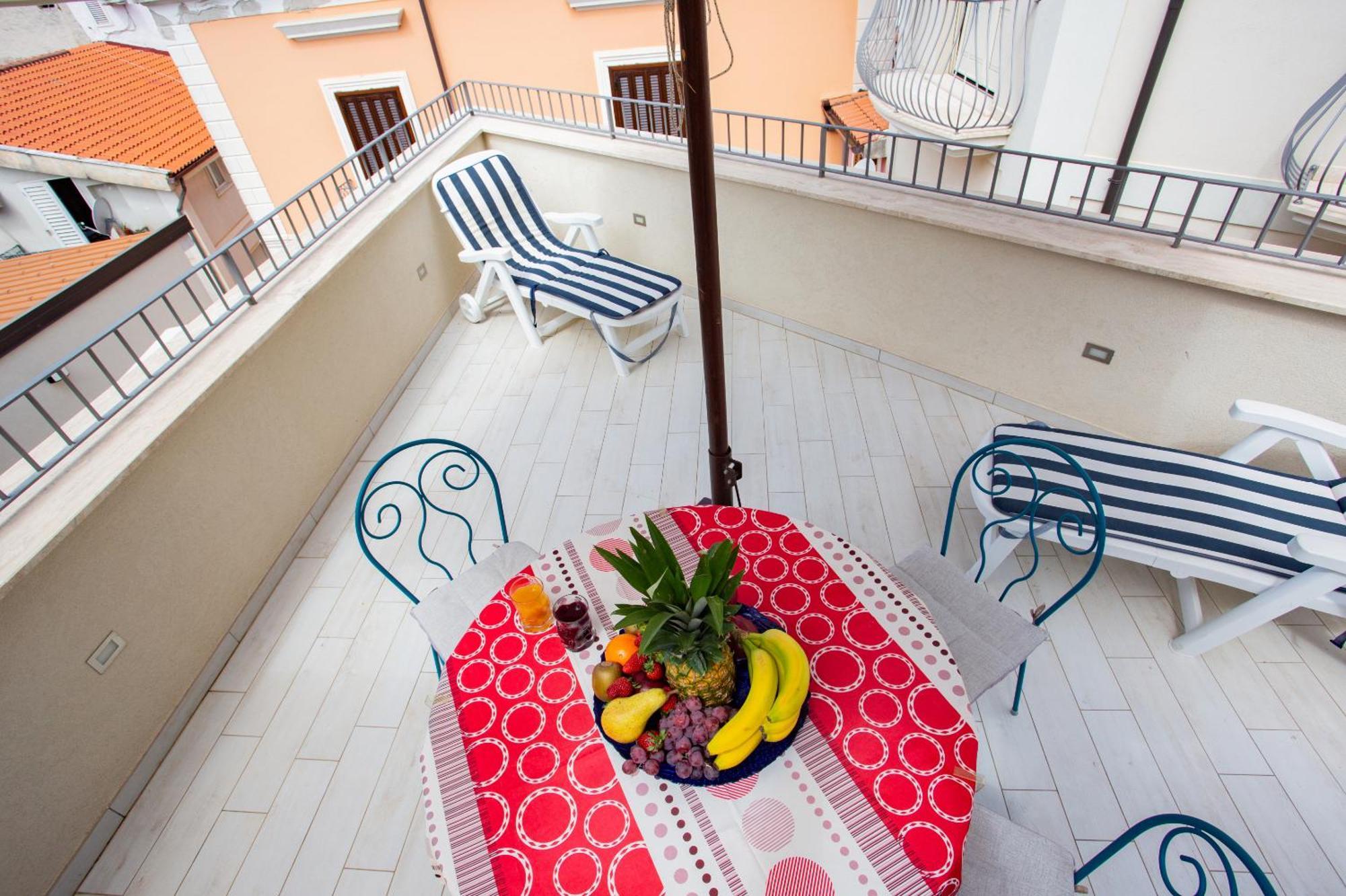 Odissea Residence E Rooms Санта-Марія-ді-Кастеллабате Номер фото